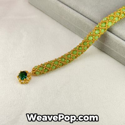B038 WeavePop Green and Gold Beaded Bracelet DIY Kit – Flat lay view showing seed beads and flat beads jewelry design