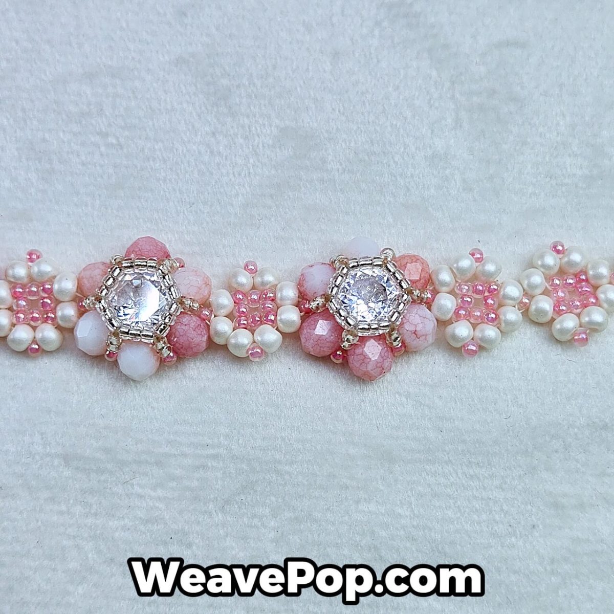 close-up of pink flower seed bead pattern with K9 crystal center – B015 detail