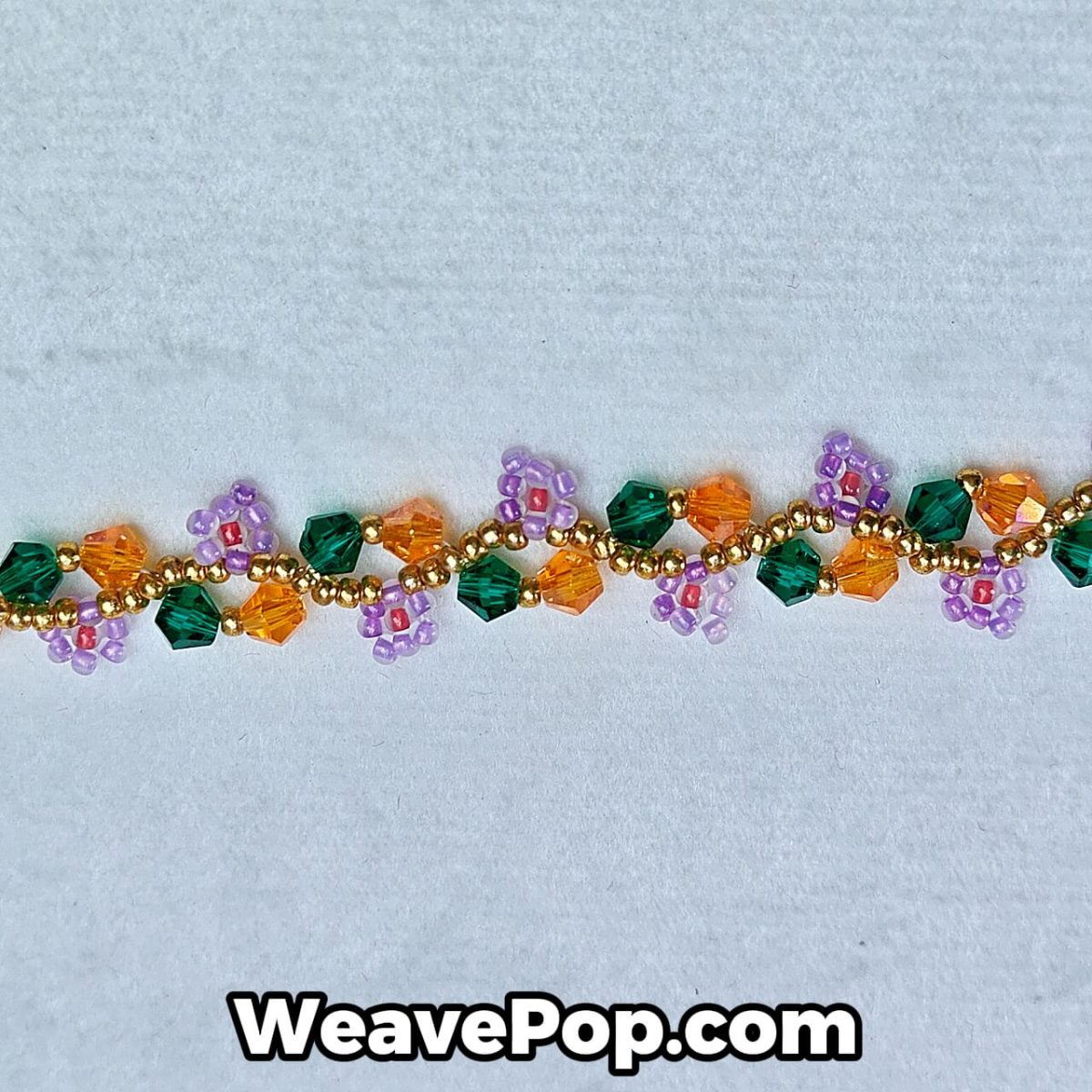 close-up of colorful flower seed bead pattern with diamond beads – B019 bracelet detail