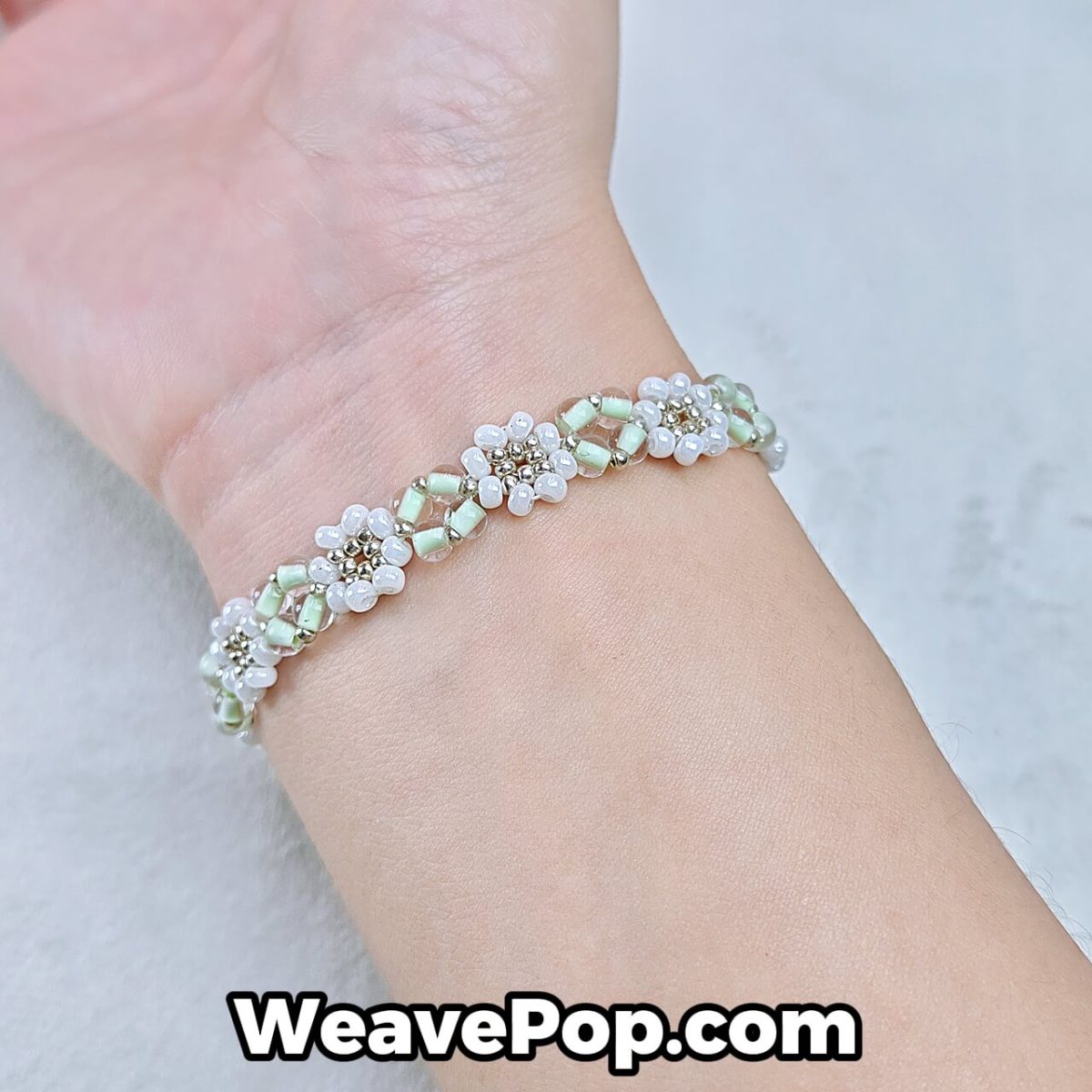 mint flower seed bead bracelet on wrist – photochromic bead bracelet kit