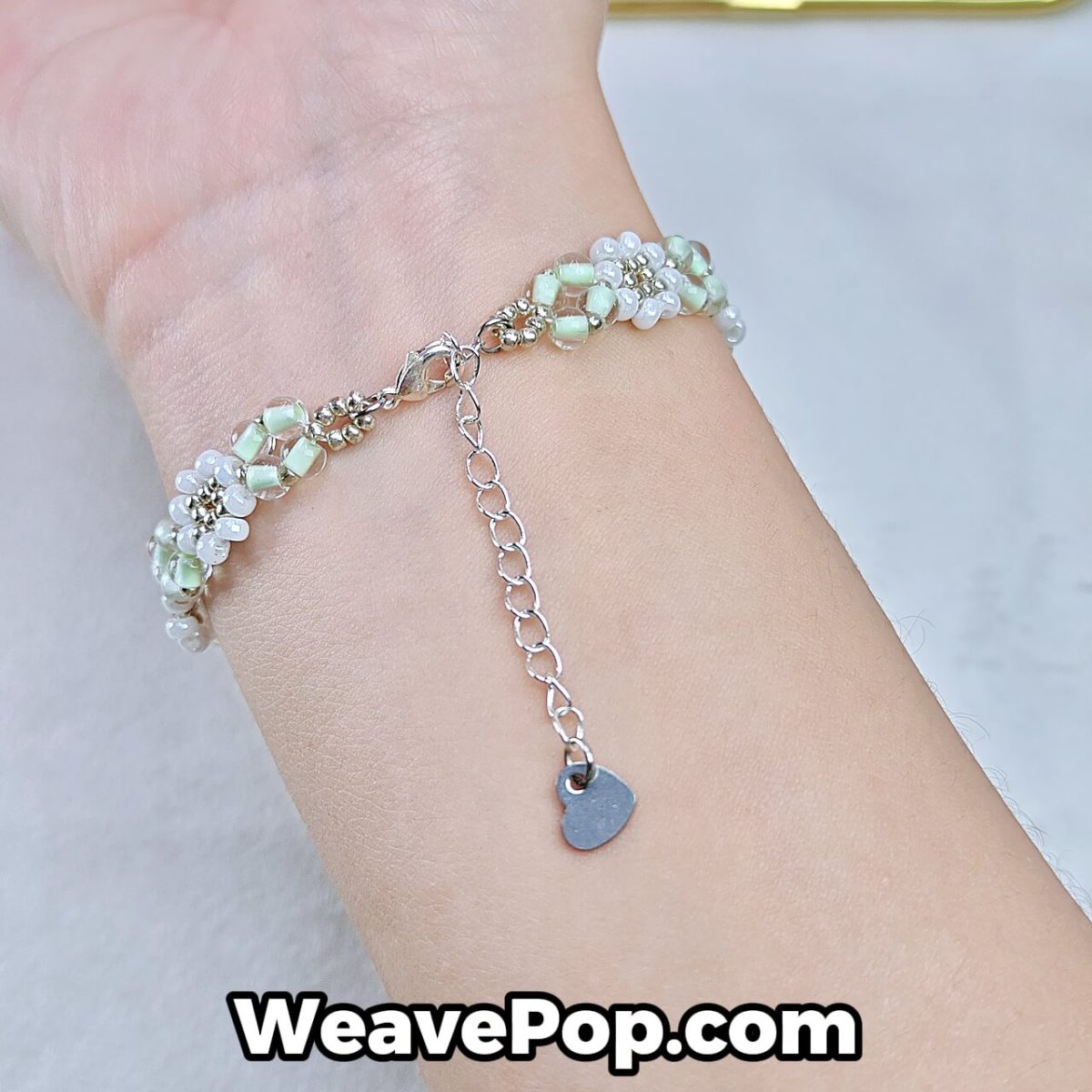 delicate mint and white bead bracelet worn on wrist – beginner bead bracelet kit