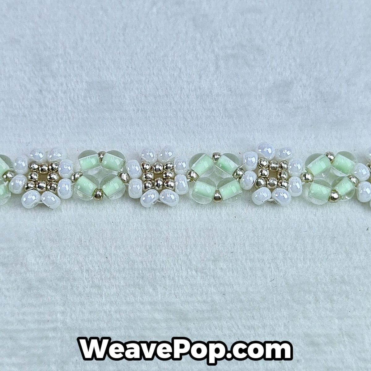 close-up of mint flower seed bead pattern with photochromic beads – B031 bracelet detail