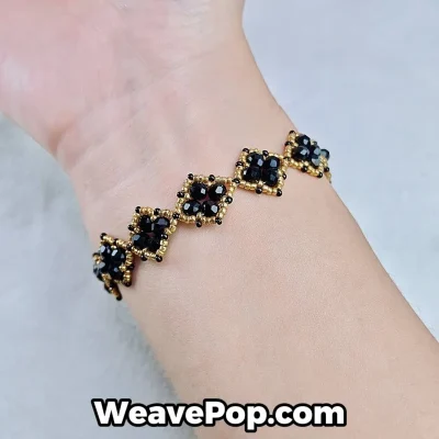 black and gold bead bracelet B042 worn on wrist