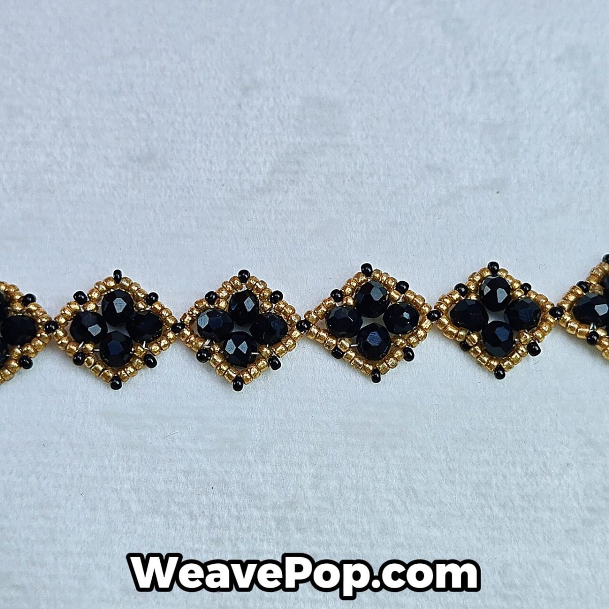 close-up detail of black and gold square bead bracelet B042 DIY kit