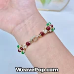 Red–Green Classic bracelet made with kit B050 shown worn on wrist