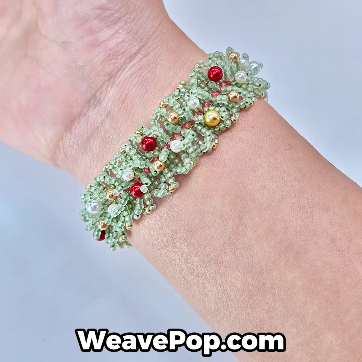green beaded bracelet handmade design worn on wrist B052