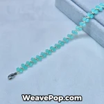 B054 lake blue bicone bead bracelet flat lay