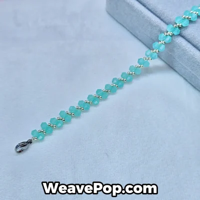 B054 lake blue bicone bead bracelet flat lay