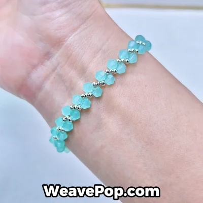 B054 lake blue bead bracelet worn on wrist