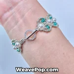 Pearl and bicone bead bracelet B057 worn on wrist