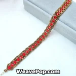 Red structured beaded bracelet flat lay