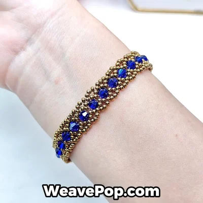 Blue beaded bracelet worn on wrist