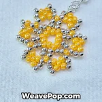 Close-up detail of yellow flower seed bead earrings – E004