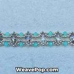 Close-up of aqua faceted beads and MIYUKI seed bead lace pattern on bracelet B062
