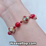 Red wide woven beaded cuff bracelet worn on wrist B065