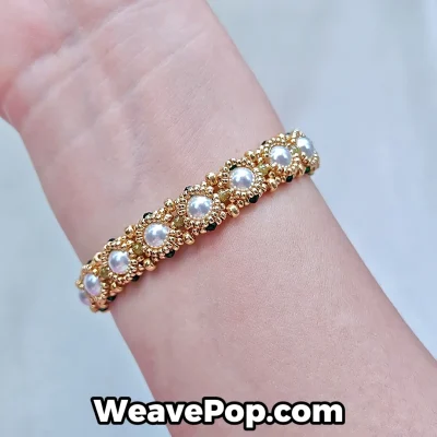 Gold pearl beaded bracelet worn on wrist B066