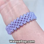 purple wide bead bracelet worn on wrist – advanced woven design B067