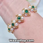 Gold pearl beaded bracelet worn on wrist – B068