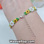 Yellow flower beaded bracelet close up