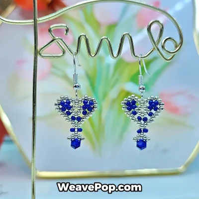blue beaded heart earrings hanging display for diy jewelry kit