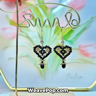 black beaded heart earrings hanging display for diy jewelry kit