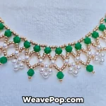 close up pearl bicone beadwork necklace