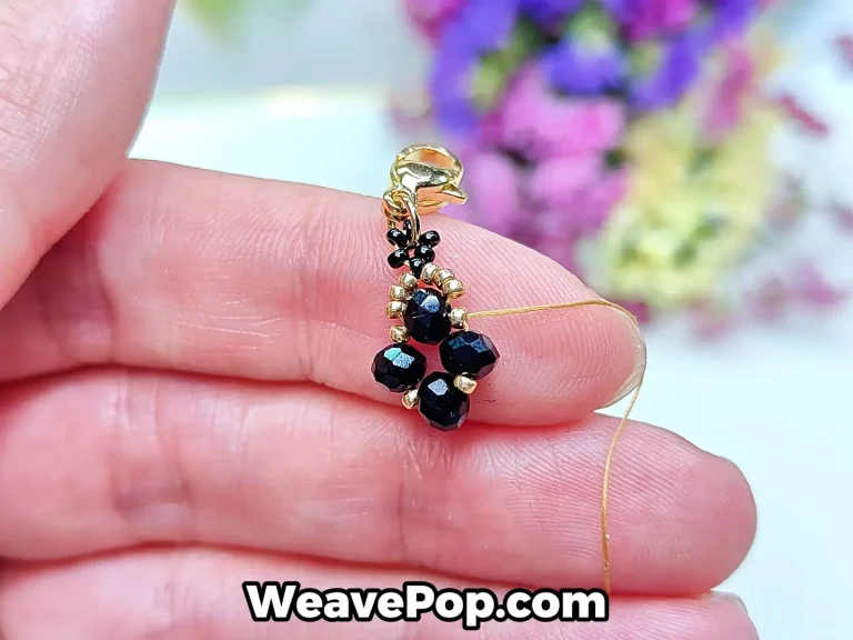 flower bead bracelet tutorial step 5 passing the thread forward through one gold bead to continue the pattern