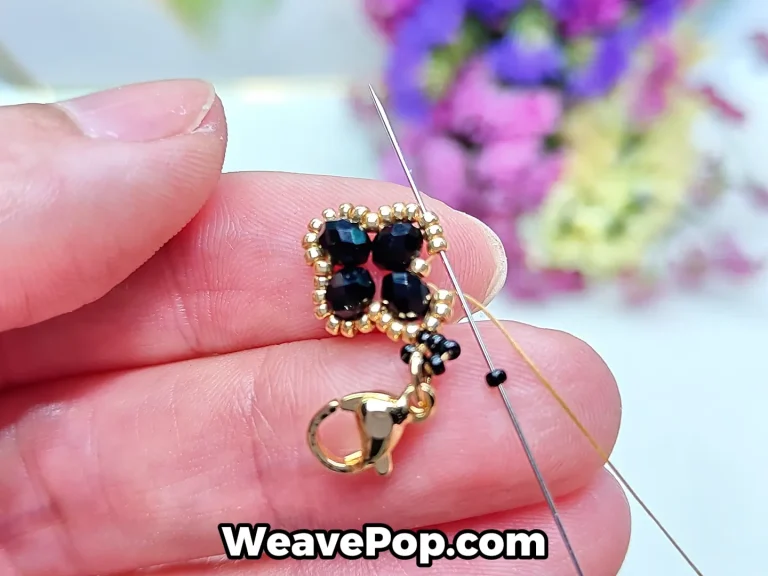 flower bead bracelet tutorial step 9 adding a black seed bead and passing the needle forward through gold seed beads
