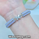 Stacked look of the purple woven bead bracelet B076 highlighting the flat weave