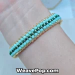 Elegant green Miyuki beaded bracelet worn for a handmade jewelry look