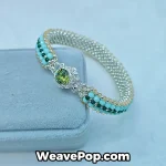 Mint green bead bracelet kit B076 showing flat weave beadwork and pearls