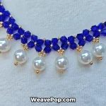 Close up of blue beaded necklace pattern with 8mm crystal pearls