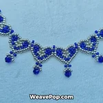 Close up of beading pattern showing beaded necklace crystal details
