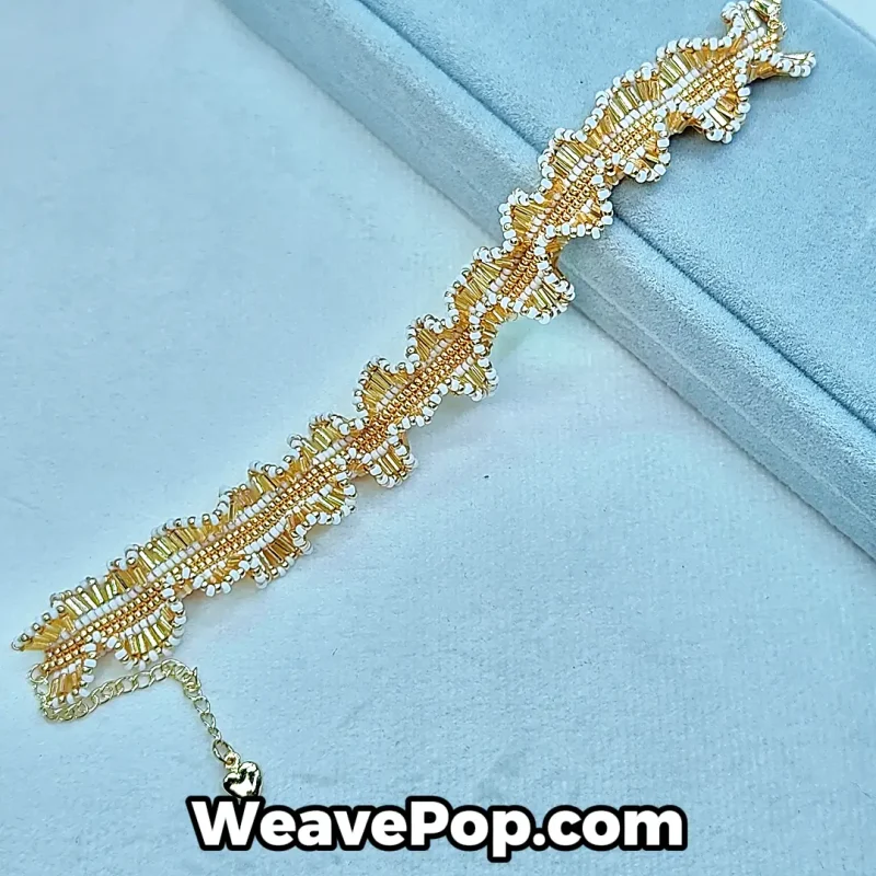 Studio product shot of the B079 DIY bead bracelet kit showing the gold and white Miyuki seed beads.