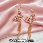 Detailed view of premium crystal pearls, bicone beads, and gold tassel findings inside E009 Earring Making Kit