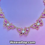 Close up view of fine crystal pearls, bicone beads, and intricate butterfly weaving pattern inside N009 Necklace Making Kit