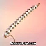 Daisy flower beaded bracelet kit featuring white floral motifs with red green and gold bead accents