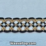 Macro detail of the black and gold geometric lace beaded bracelet B081, highlighting the interlocking oval links with MIYUKI 401 seed beads and flat bead centerpieces