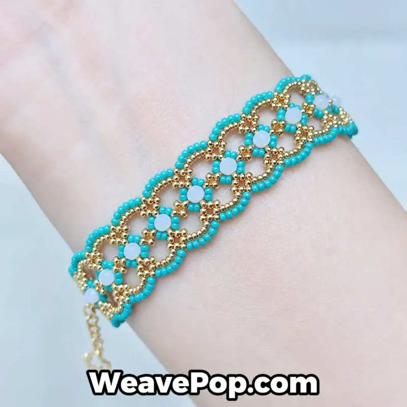 Woman wearing the turquoise and gold geometric interlocking beaded bracelet B081 on wrist, showcasing the vibrant turquoise MIYUKI seed bead and gold accent lace design