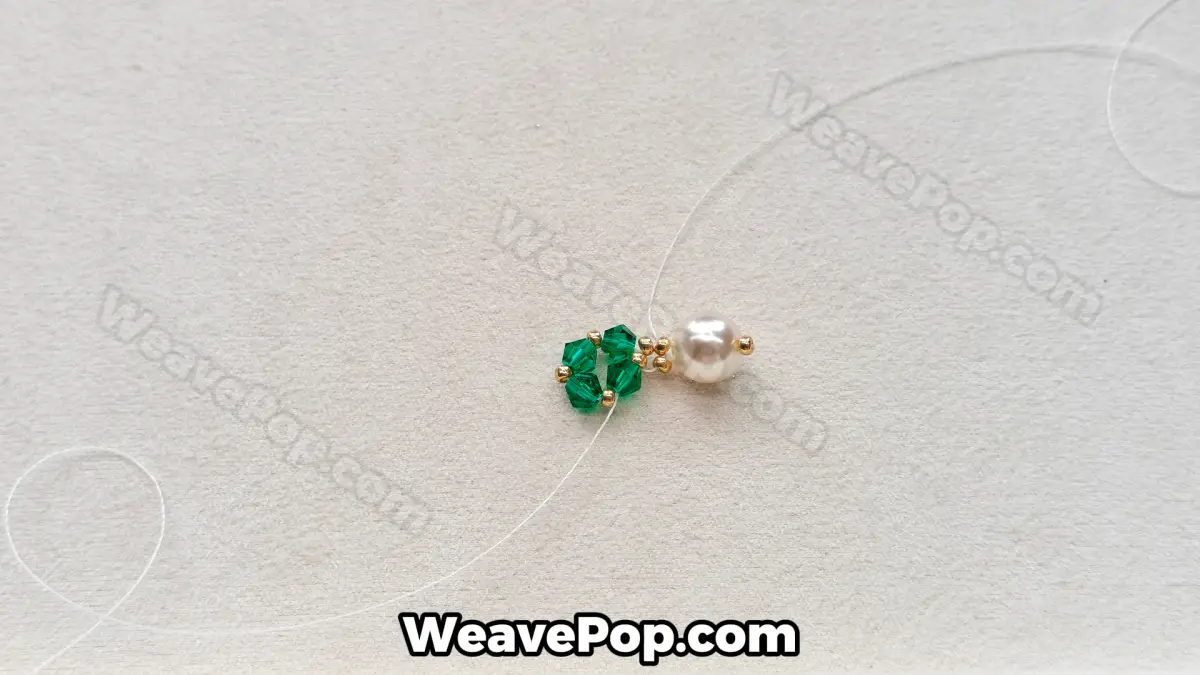Step 11 of this seed bead necklace beading pattern - Securing the pearl