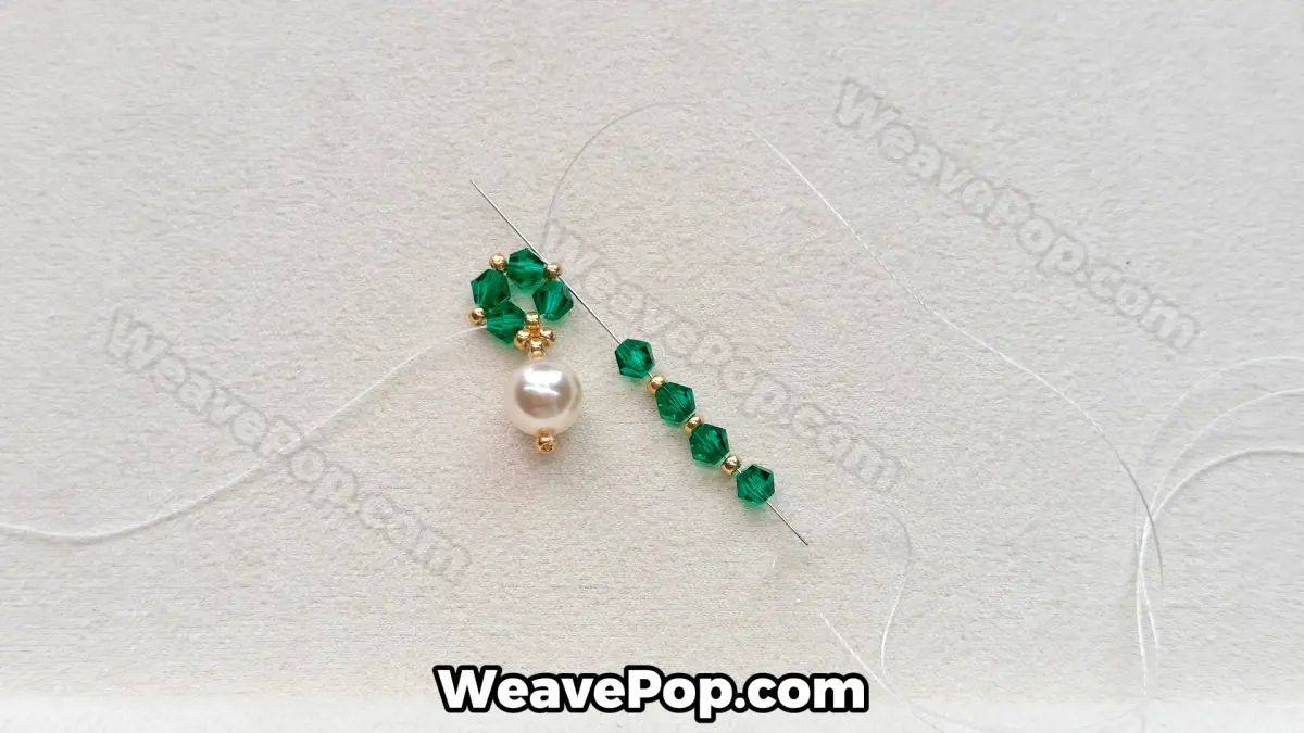 Step 14 of this seed bead necklace beading pattern - Stringing the second cluster