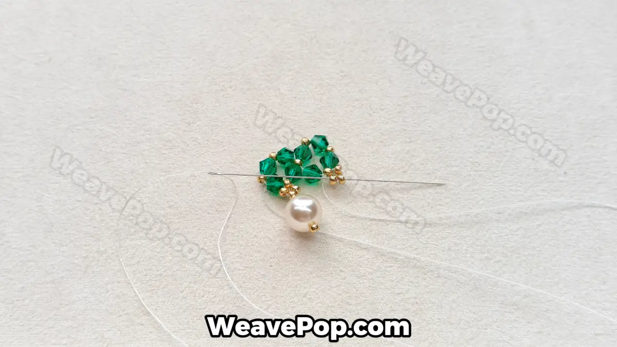 Step 17 of this seed bead necklace beading pattern - Reinforcing gold beads