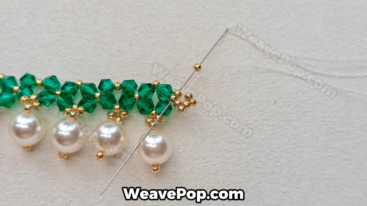 Step 27 of this seed bead necklace beading pattern - Reinforcing the anchor