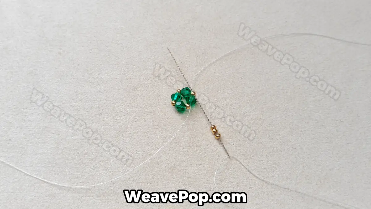 Step 5 of this seed bead necklace beading pattern - Adding gold beads