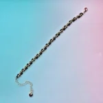Gold and black twisted bead bracelet laid flat — B082 DIY Bracelet Kit by WeavePop